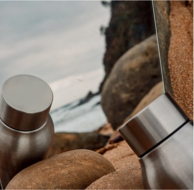 Oublé gallery image showing sustainable bottle design